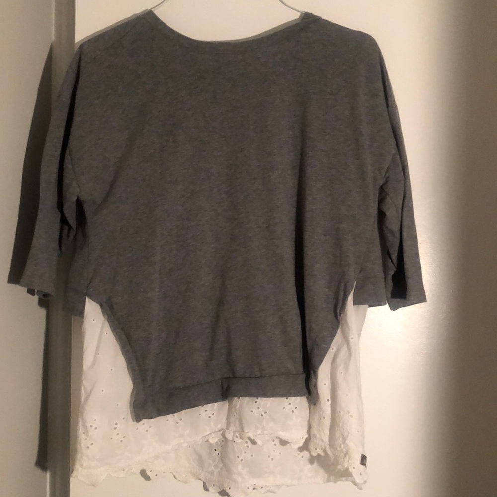 Sweater with white lace under trim